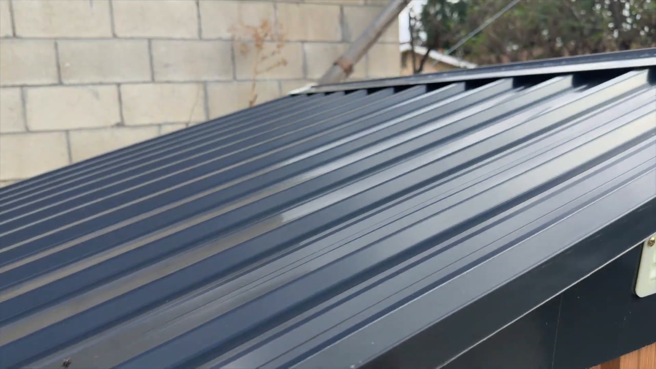 Close-up of the corrugated galvanized steel roof panels on the Florise 6x4 metal storage shed